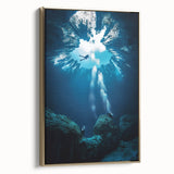 Framed canvas artwork showcasing a stunning landscape with intricate cave details and golden accents, perfect for enhancing modern home decor.