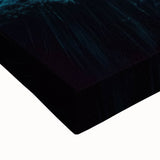 Close-up of a stretched canvas artwork depicting a vibrant landscape with intricate cave formations, showcasing earthy tones and textured details, perfect for home decor.