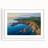 Framed landscape artwork showcasing majestic cliffs with a white mat, perfect for home decor. Ideal for nature lovers seeking to enhance their living space.