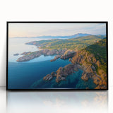 Framed acrylic artwork showcasing a dramatic cliff landscape in vivid colors, with a sleek black frame enhancing its modern aesthetic, perfect for home decor.