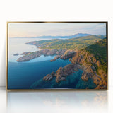 Framed acrylic art piece showcasing a stunning landscape of cliffs with golden accents, perfect for enhancing modern home decor and adding a touch of elegance.