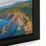 Close-up of a framed canvas depicting a dramatic landscape with rugged cliffs and vibrant colors, showcasing intricate textures and natural beauty, ideal for home decor.