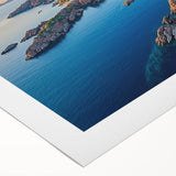 Vibrant rolled canvas showcasing a stunning landscape of dramatic cliffs and serene waters, perfect for home decor. Packaged securely in a protective cardboard tube.