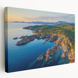 Stretched canvas artwork showcasing a dramatic cliff landscape in vibrant colors, ideal for modern home decor. Perfect for adding an adventurous touch to living spaces.