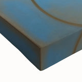 Close-up of a vibrant abstract geometric stretched canvas featuring bold colors and intricate patterns, ideal for modern home decor and artistic displays.