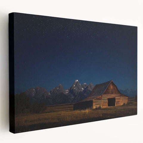 Stretched canvas artwork depicting a serene landscape with a rustic barn, showcasing vibrant colors and detailed texture, perfect for home decor.
