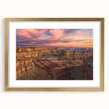 Elegant landscape print of canyons framed in a gold mat, showcasing warm earthy tones and intricate details, perfect for enhancing home decor and art collections.