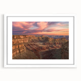 Landscape artwork of canyons framed with a white mat, showcasing vibrant colors and intricate details, ideal for home decor and art enthusiasts. Perfect for adding depth and character to living spaces.