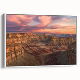 Framed canvas art depicting a stunning landscape of colorful canyons, showcasing rich earthy tones and intricate details, perfect for home decor enhancement.