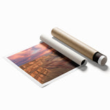 Stunning rolled landscape print showcasing vibrant canyons in rich earthy tones, ideal for home decor. Packaged securely in a cardboard tube for safe delivery.