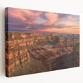 Stretched canvas artwork depicting a vibrant landscape of canyons in warm earth tones, showcasing intricate details and textures, ideal for home decor.