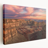 Stretched canvas artwork depicting a vibrant landscape of canyons in warm earth tones, showcasing intricate details and textures, ideal for home decor.