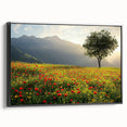 Framed canvas artwork showcasing a serene countryside landscape with vibrant green fields and a blue sky, featuring a sleek black frame for an elegant display.