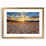 Elegant gold-framed landscape art showcasing a serene desert scene with vibrant colors, perfect for enhancing home decor and creating a warm atmosphere.