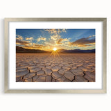Elegant silver-framed landscape art showcasing a serene desert scene with soft golden hues and intricate matting, perfect for home decor enhancement.