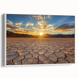 Framed canvas artwork showcasing a vibrant desert landscape with warm hues of orange and yellow, displayed from a side view against a white background. Ideal for home decor.