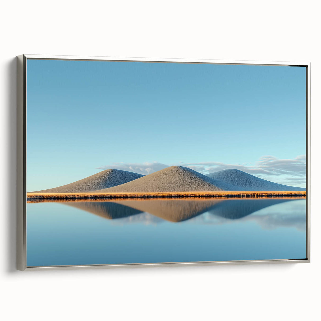Framed canvas artwork showcasing a serene landscape of fields under a cloudy sky, featuring a silver frame that complements the tranquil scene. Perfect for home decor.