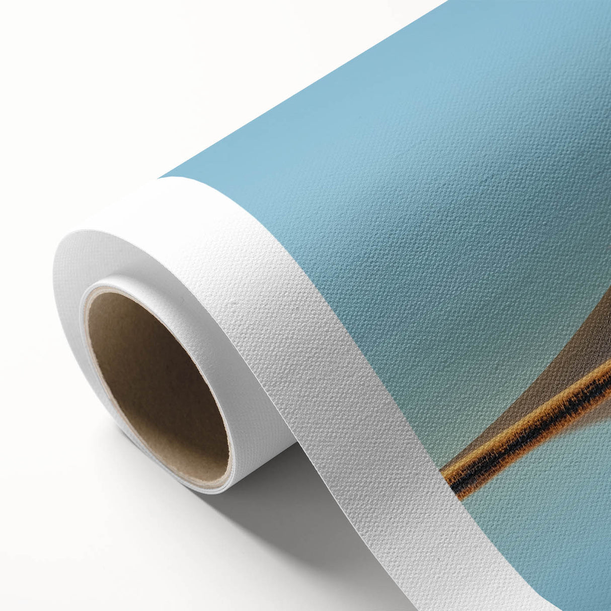 Vibrant rolled canvas depicting a picturesque landscape with lush green fields under a blue sky, elegantly packaged in a durable cardboard tube for safe transport.