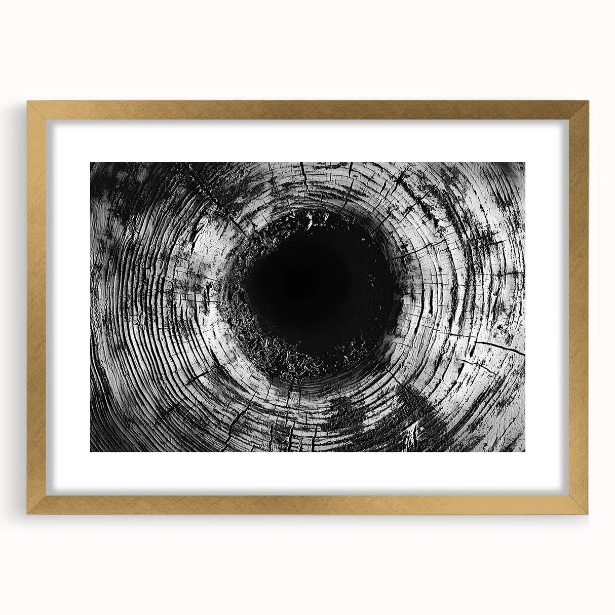 Extra large abstract art print featuring textured patterns in earthy tones on a gold-framed canvas.