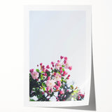 Rolled canvas print featuring a vibrant floral design in pastel shades.