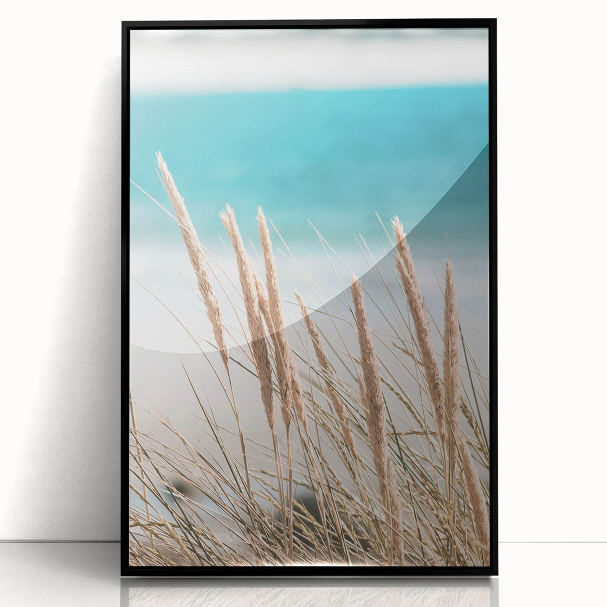 Large abstract wall art in vibrant orange and yellow tones on a black acrylic frame, ideal for modern living room decor.