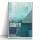 Framed abstract wall art featuring colorful strokes in vibrant hues of blue, orange, and yellow, set against a sleek white background, ideal for modern home decor.