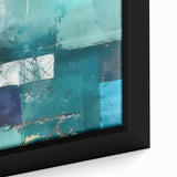 Close-up of a framed canvas wall art featuring abstract strokes in vibrant colors like blue, gold, and pink, perfect for modern home decor.
