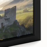 Close-up of a beautifully framed canvas featuring a stunning landscape of a castle surrounded by lush greenery, showcasing intricate details and vibrant colors, perfect for home decor.