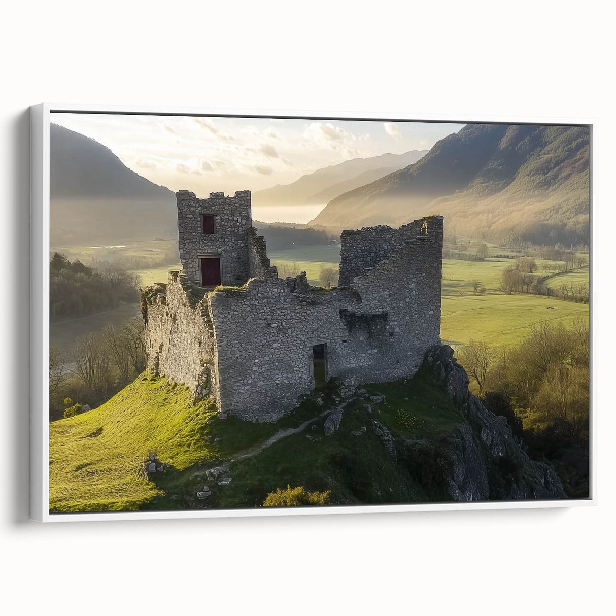 Framed canvas artwork depicting a picturesque landscape with a medieval castle, featuring vibrant colors and intricate details, set against a serene backdrop.