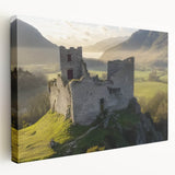 Stretched canvas artwork depicting a picturesque landscape with a majestic castle surrounded by lush greenery, showcasing vibrant colors and intricate details. Ideal for enhancing home decor with a touch of classic elegance.