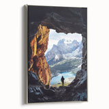 Framed canvas artwork depicting a serene landscape with caves, featuring a sleek silver frame and vibrant colors, perfect for enhancing home decor.