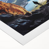 Rolled canvas artwork depicting a serene landscape with caves and natural formations, showcasing earthy tones and intricate details, ideal for home decor.