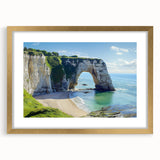 Elegant gold-framed landscape artwork showcasing dramatic cliffs, enhanced by a white mat, perfect for adding sophistication to any home decor.