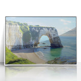 Framed acrylic artwork depicting a serene landscape of cliffs under a bright blue sky, featuring vibrant colors and intricate details, perfect for home decor.