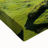 Close-up of a stretched canvas artwork depicting dramatic cliffs and vibrant landscapes, showcasing rich colors and intricate textures, perfect for home decor.