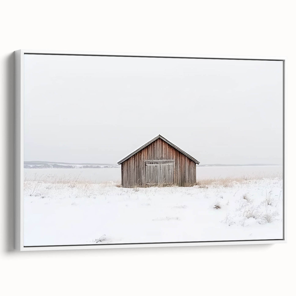 Framed landscape canvas art showcasing a serene barn scene in soft colors, presented from a side view, ideal for rustic home decor enthusiasts.