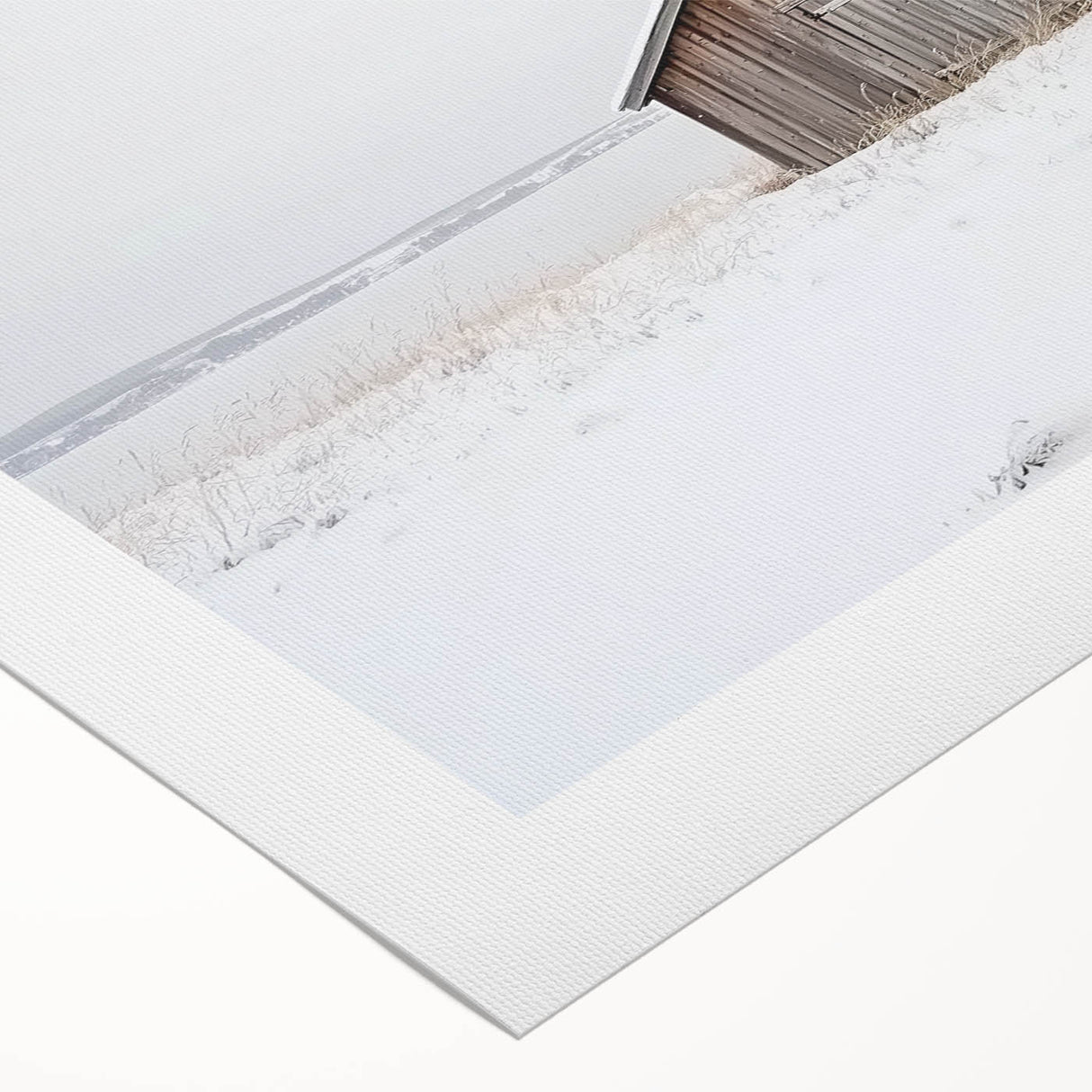Rolled canvas showcasing a vibrant landscape barn design with rich colors and intricate details, securely packaged in a protective cardboard tube for easy transport.