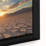 Close-up of a framed canvas print showcasing a stunning desert landscape with vibrant colors, textured details, and a modern black frame, perfect for home decor.