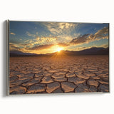 Framed canvas artwork depicting a serene desert landscape with warm earth tones, silver frame enhancing its elegance, perfect for home decor or office space.