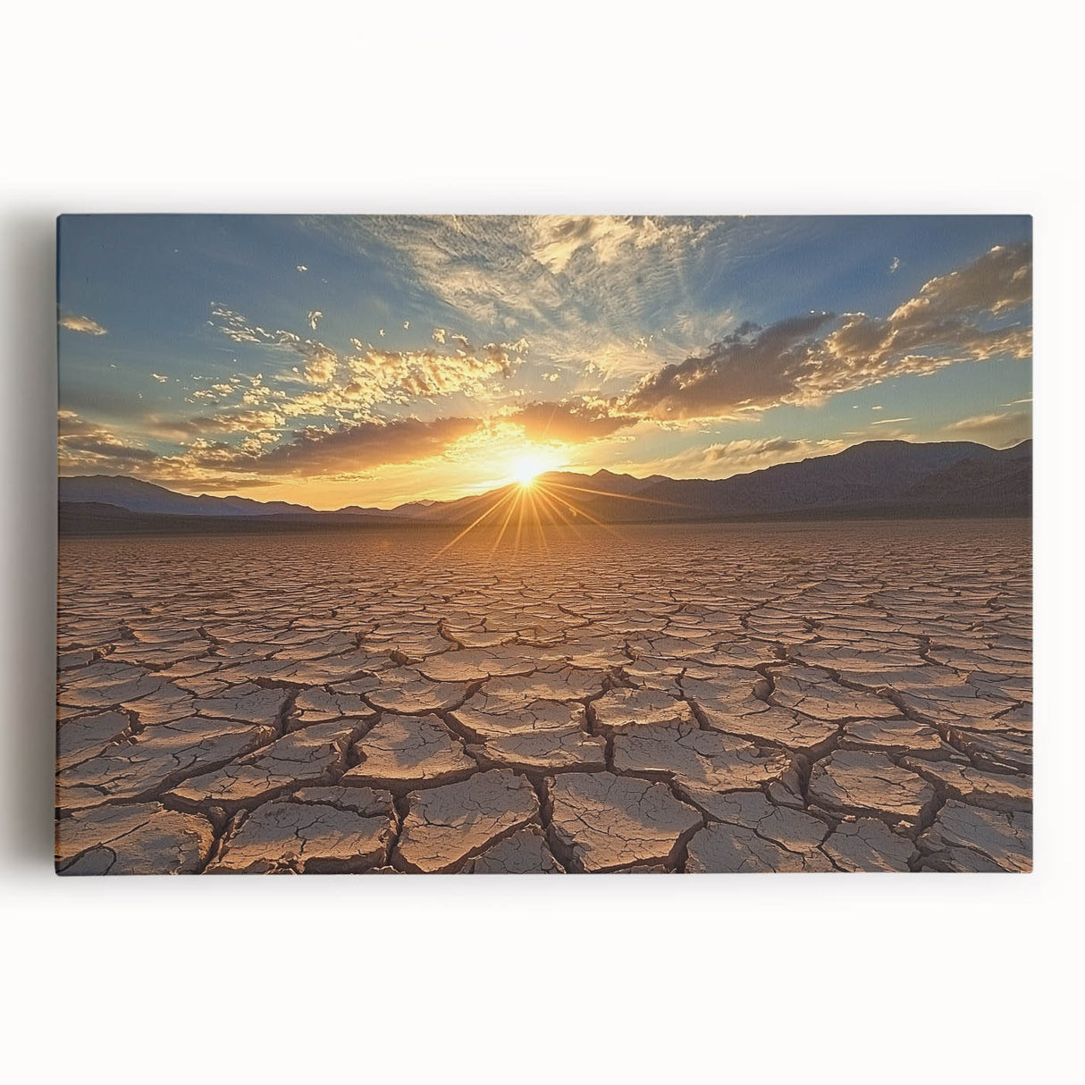 Stretched canvas artwork depicting a serene desert landscape at sunset, featuring vibrant orange and purple hues, perfect for enhancing home decor aesthetics.