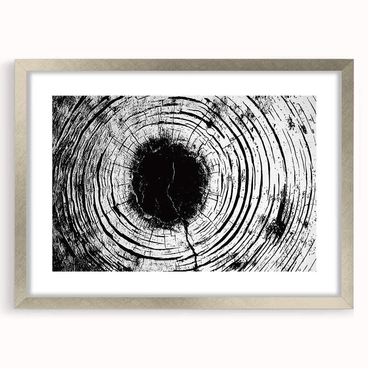 Textured art print featuring abstract nature elements in muted earth tones, framed in silver, ideal for bedroom art.