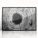 Large abstract wall art featuring swirling blue and green patterns, in a black frame.