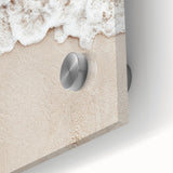 Large abstract wall art in vibrant orange and yellow tones on acrylic glass.