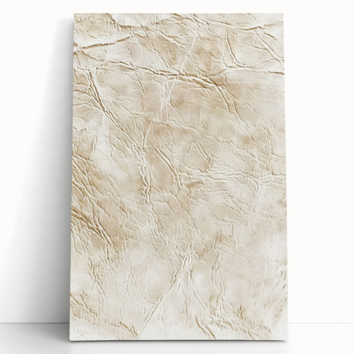 Abstract strokes wall art on stretched canvas, featuring vibrant colors of blue, orange, and gold, leaning against a white wall, adding a modern touch to home decor.