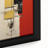 Close-up of framed abstract wall art featuring vibrant strokes in shades of blue, orange, and yellow, perfect for modern home décor and artistic expression.