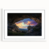 Framed landscape artwork depicting caves, featuring a white mat and sleek design, ideal for home decor or office settings, enhancing any interior style.
