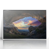 Framed acrylic wall art depicting an abstract landscape with cave formations, featuring a white frame that enhances the vibrant colors and intricate details, perfect for modern home decor.