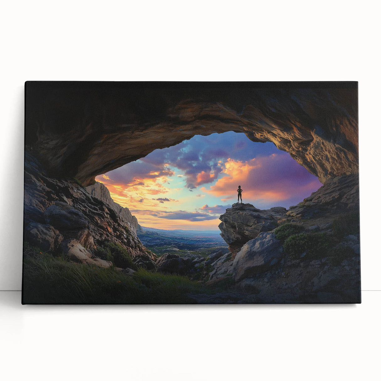 Stretched canvas artwork showcasing a breathtaking landscape of colorful caves, leaning against a wall, ideal for home decor and art enthusiasts.