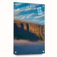 Stunning acrylic glass artwork depicting a serene landscape of towering cliffs, showcasing vivid colors and intricate details, ideal for modern home decor.