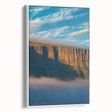 Framed canvas print showcasing a stunning cliff landscape with vibrant colors, set against a white background, ideal for enhancing modern home decor.